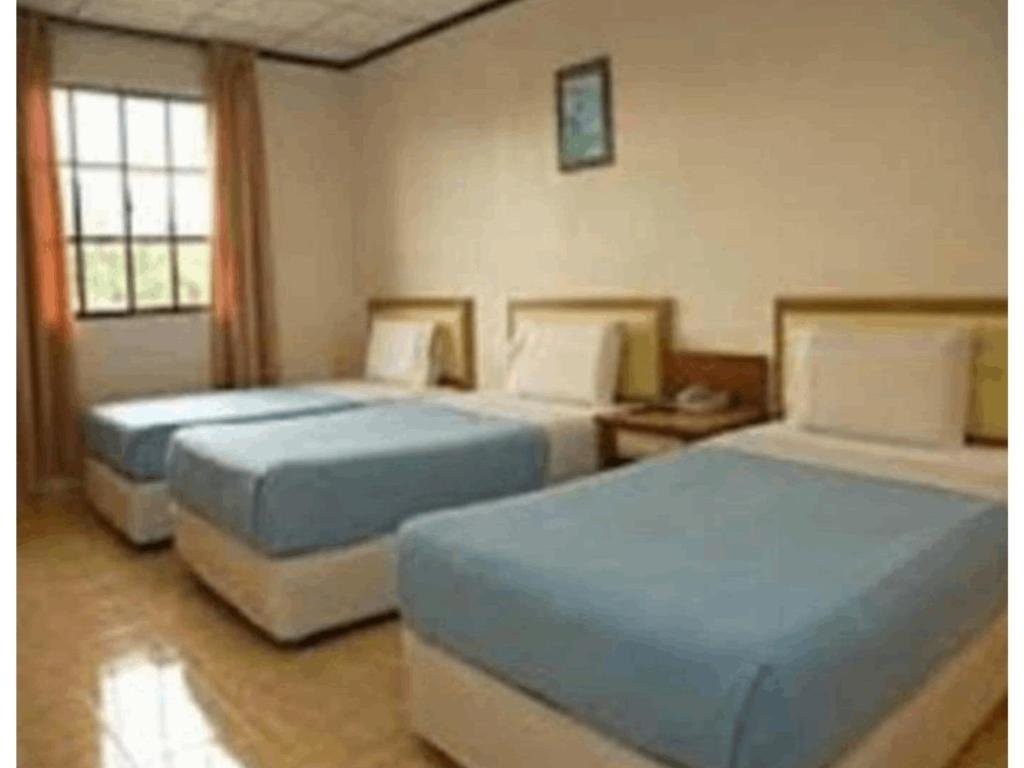 Standard triple chambre TS Hotel - Taman Rinting