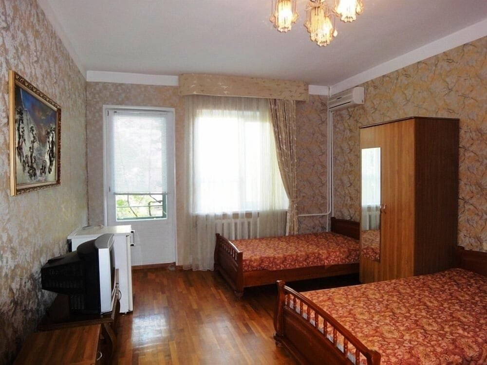 Habitación cuádruple Estándar 1 dormitorio Na Krasnozelenykh 38 Guest House