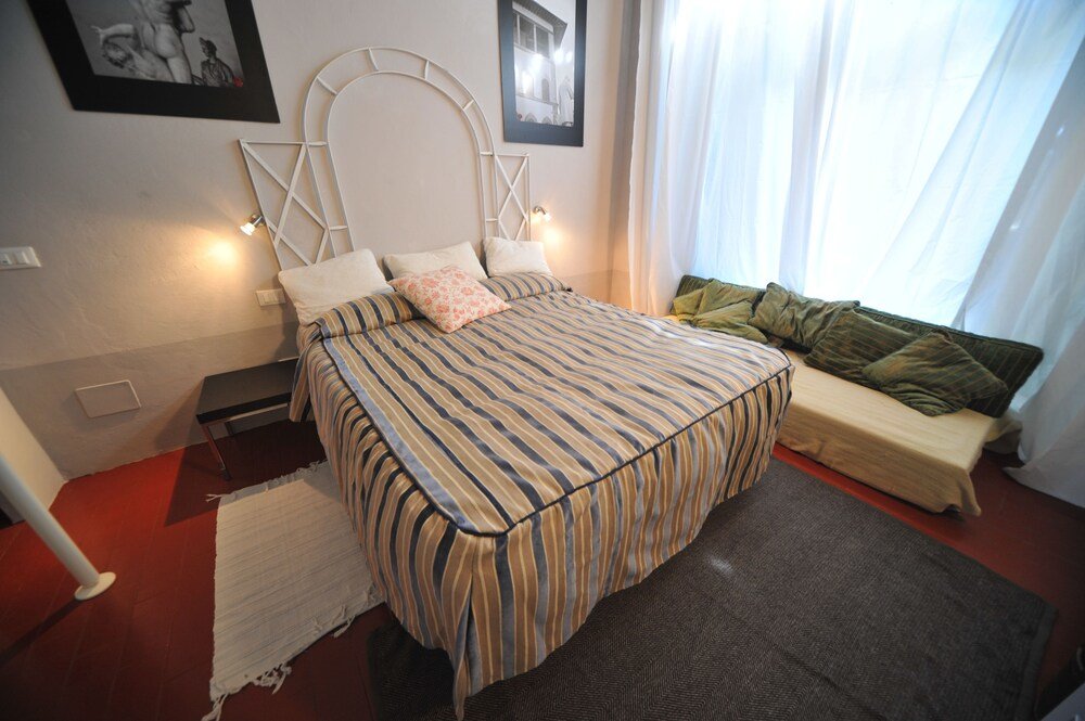 Apartment 1 Schlafzimmer mit Flussblick Residenza Aria della Ripa - Apartments & Suites