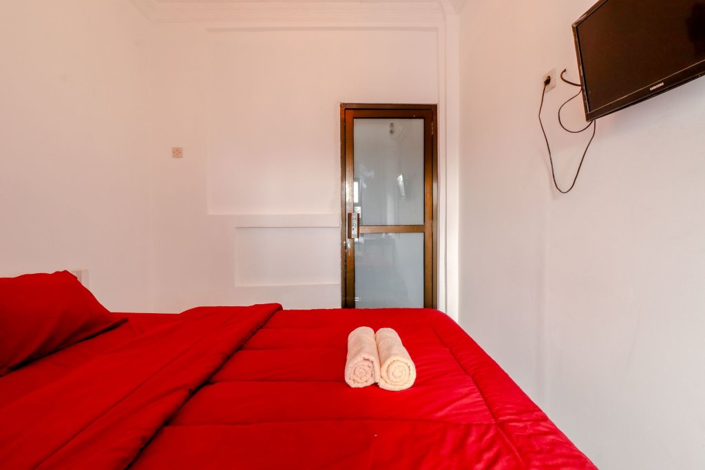 Кровать в общем номере (мужской номер) Griya Batik D'santoso