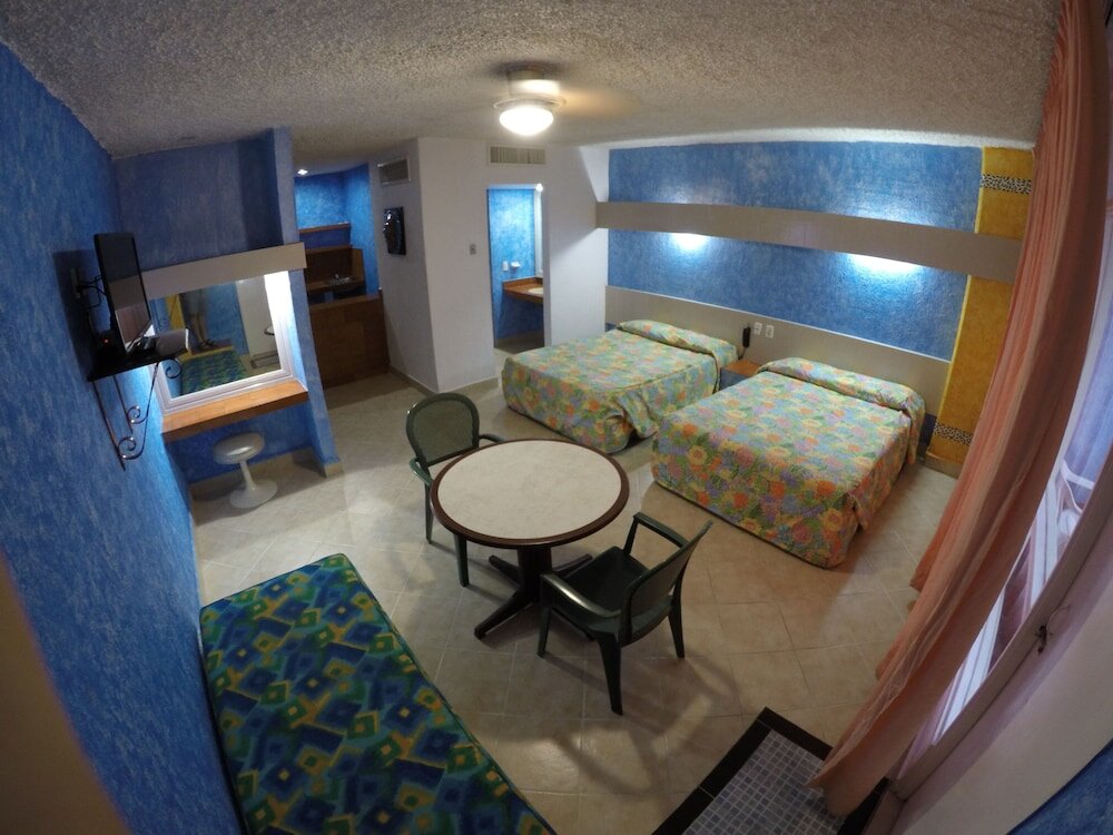 Standard quadruple chambre avec balcon Hotel Club del Sol Acapulco by NG Hoteles