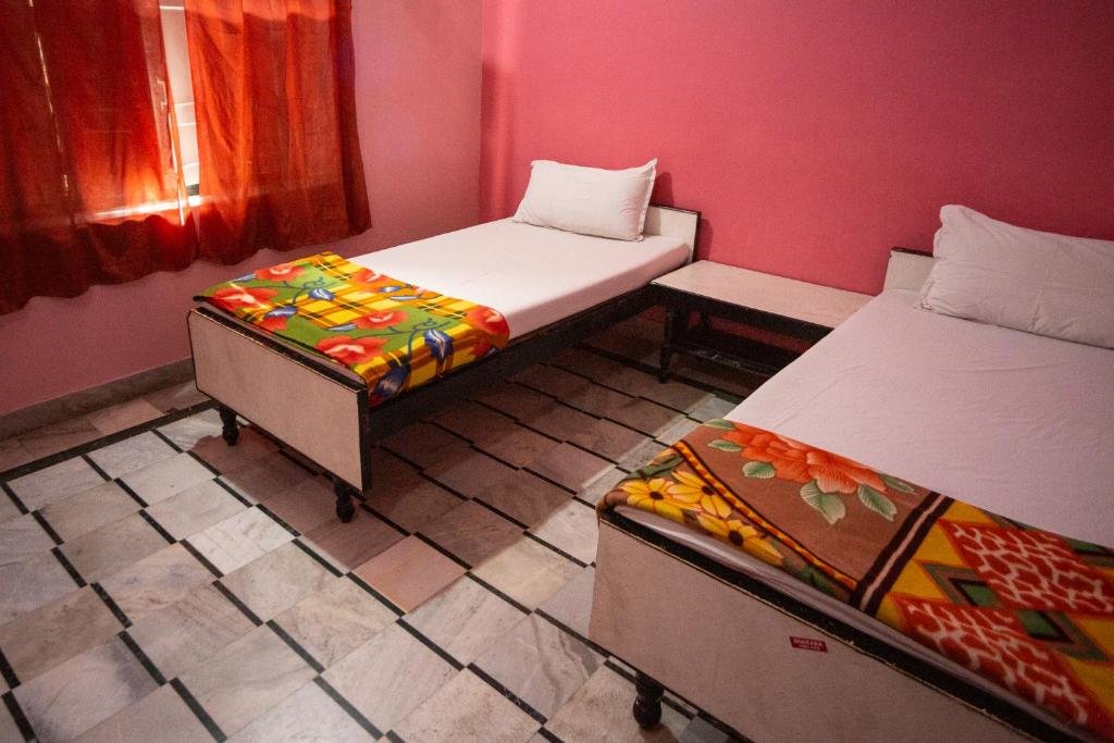 Bett im Wohnheim Hotel Mewad Haveli Pushkar