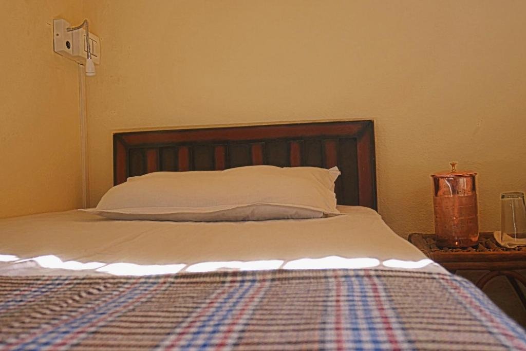 Cama en dormitorio compartido (dormitorio compartido femenino) Nature Care Village- Rajaji National Park