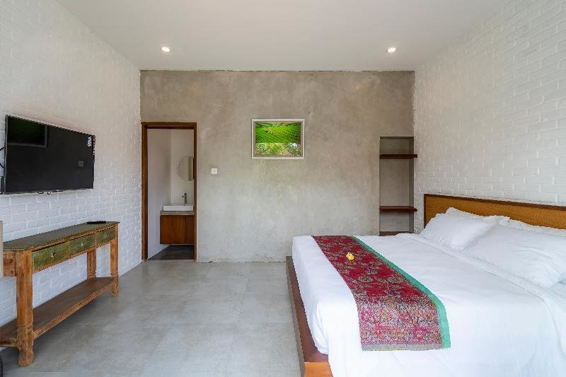 Suite 1 dormitorio con balcón y con vista Utamas Keramas