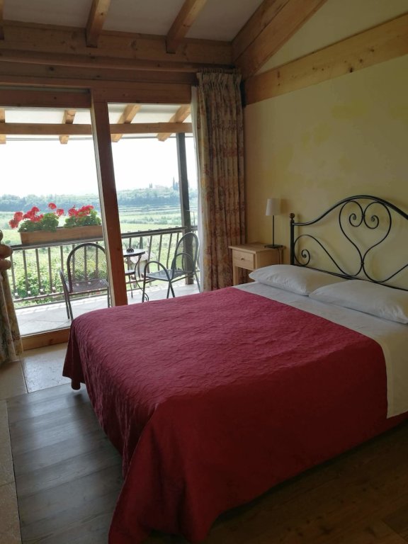 Superior Double room with balcony Costa degli Ulivi