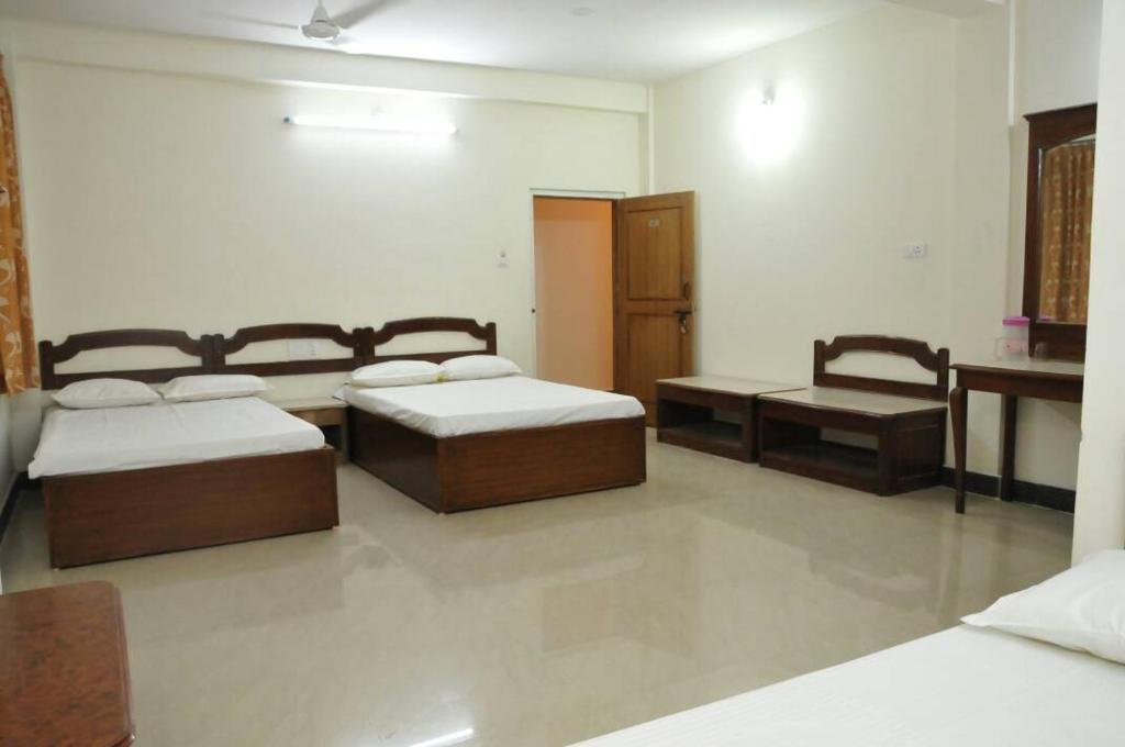 Кровать в общем номере Mahalakshmi Comforts