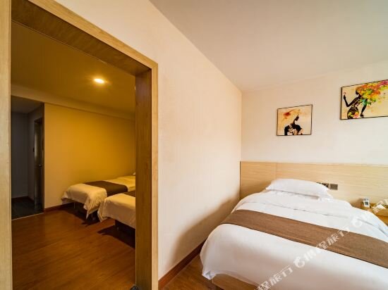 Cama en dormitorio compartido Mancheng Hotel