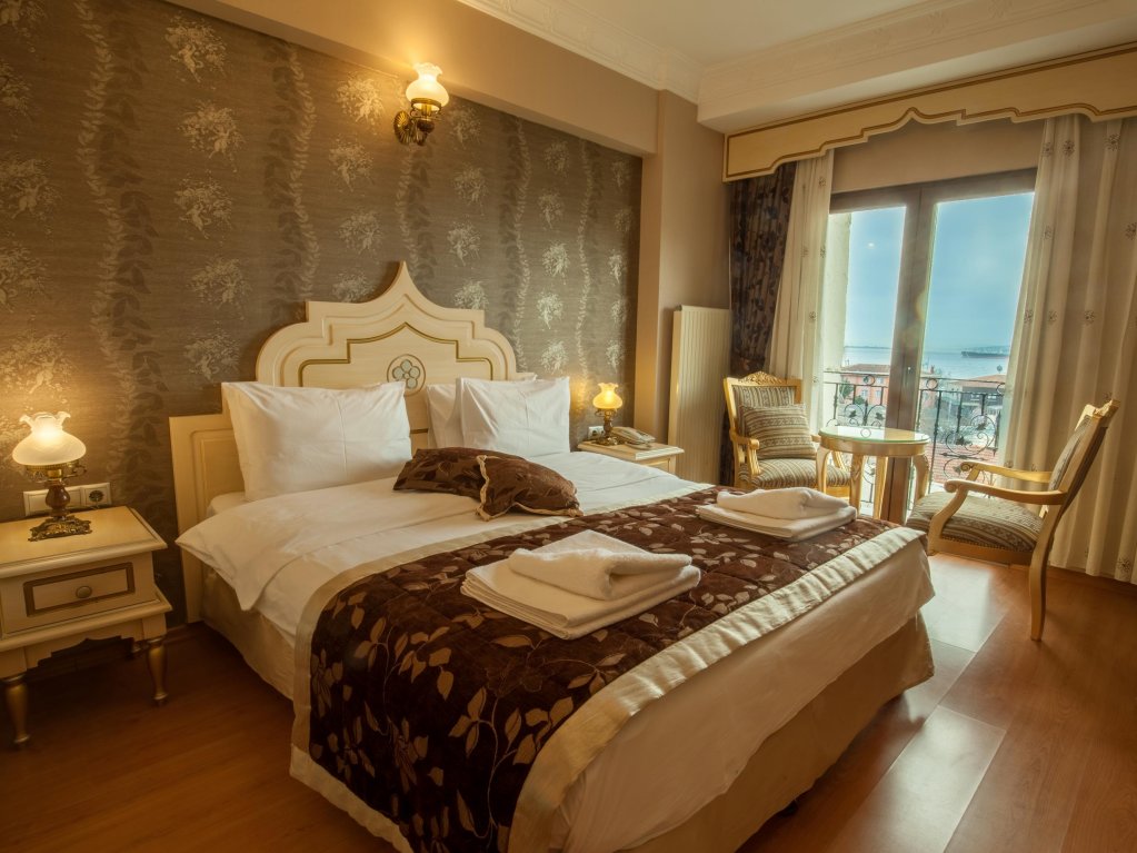 Bett im Wohnheim Saba Sultan Hotel