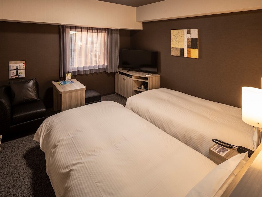 Habitación doble Confort Hotel Route Inn Matsuyama -Katsuyama Dori