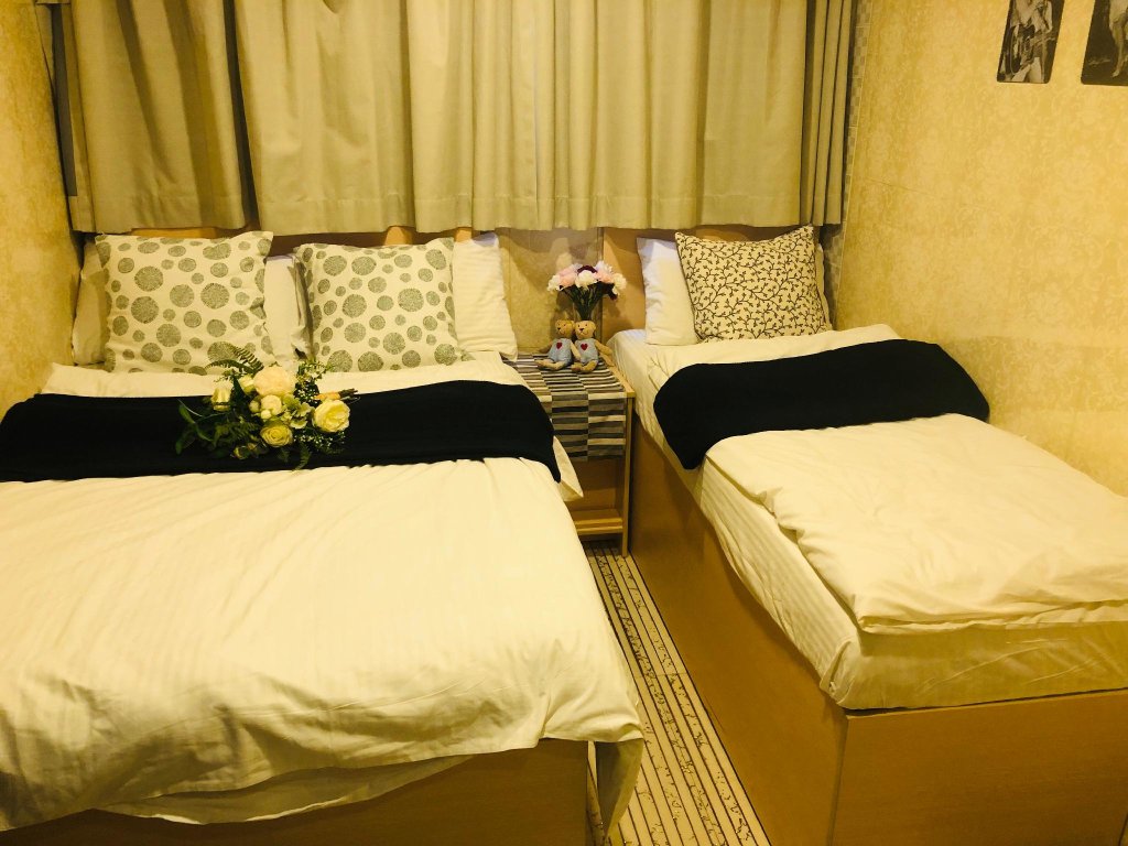 Standard triple chambre Hoi To Hostel