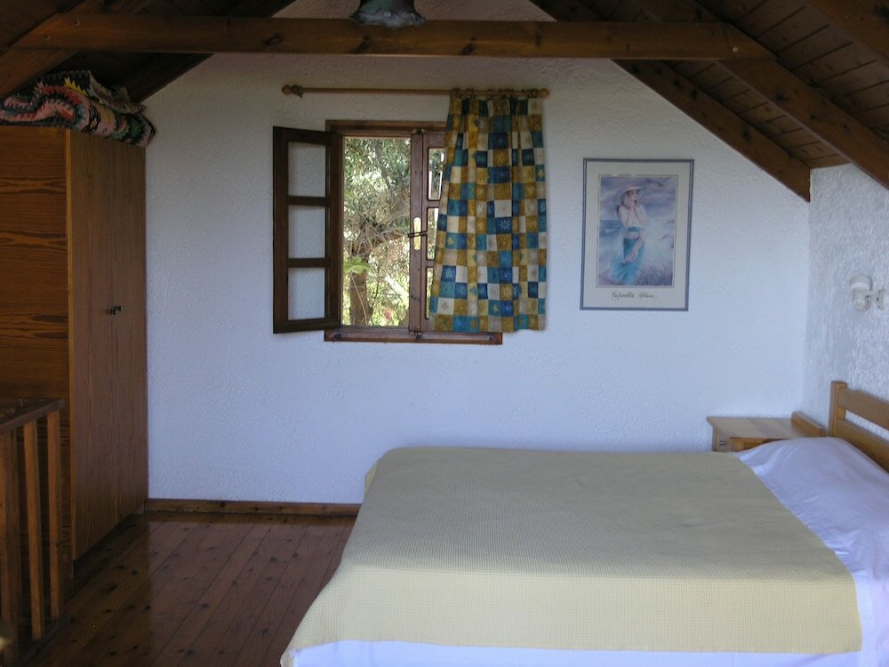 Cabaña familiar 2 dormitorios con balcón y frente a la playa Olive Tree Cottages