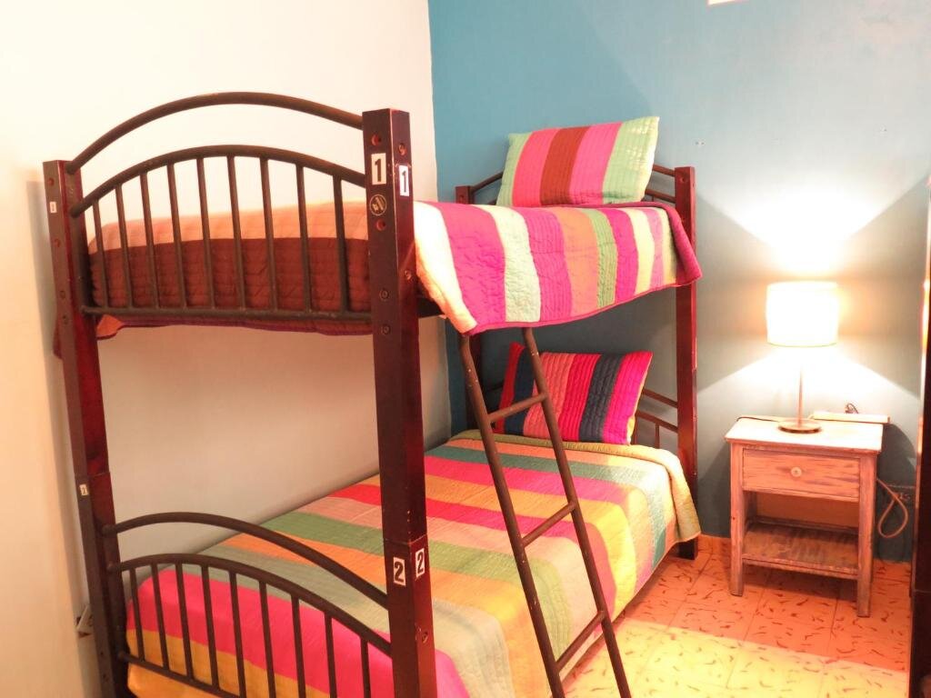 Кровать в общем номере Panama House Bed & Breakfast