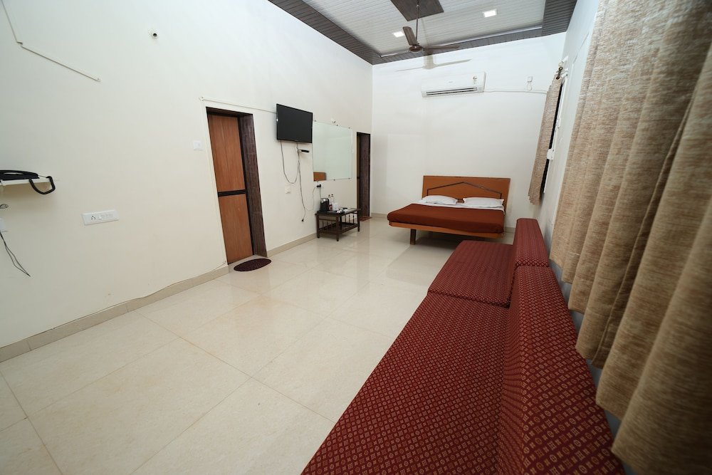 Standard Quadruple room Gujarat Bhavan Hotel
