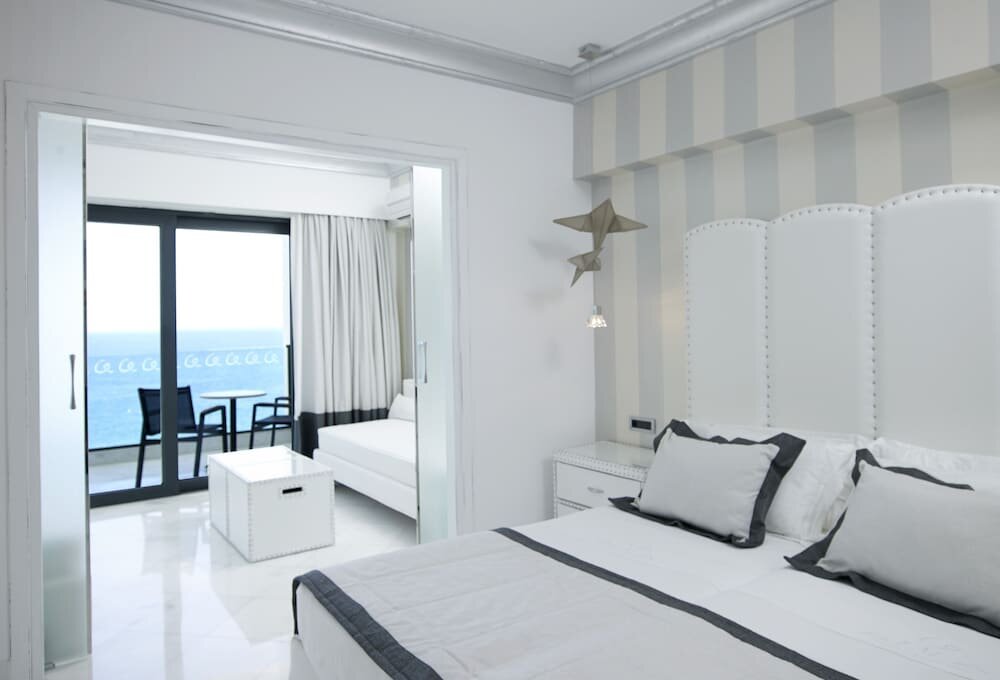 Семейный номер с балконом и с видом на море Mitsis Alila Resort & Spa