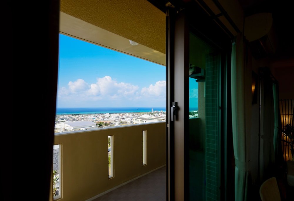 Люкс с балконом и с видом на океан United Resort Yomitan