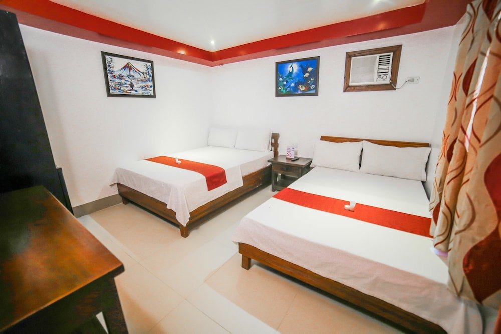Standard quadruple chambre Bataan White Corals Beach Resort