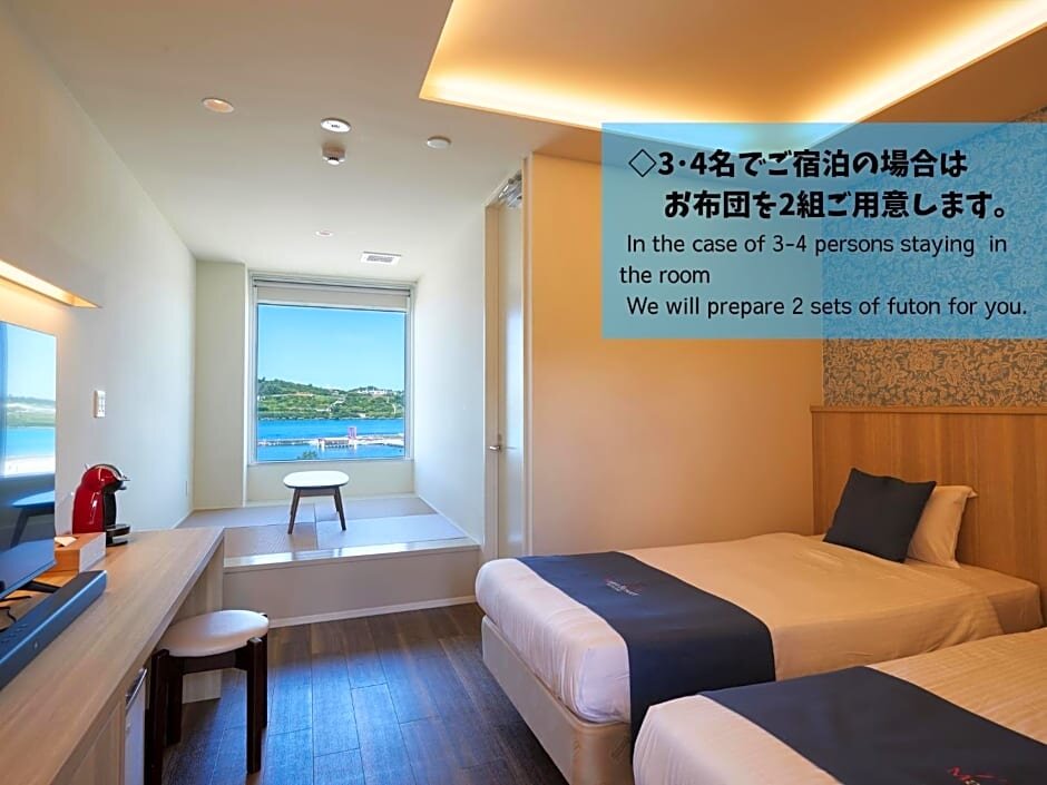Standard quadruple chambre Vue mer Marea Resort Motobu