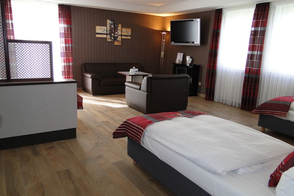 Четырёхместный номер Deluxe c 1 комнатой Hotel Rhöner Land Garni - Bed & Breakfast
