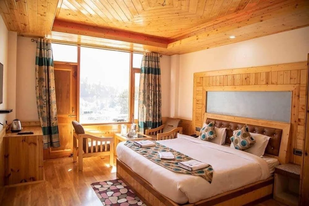 Luxe chambre Hotel Uday Himalaya