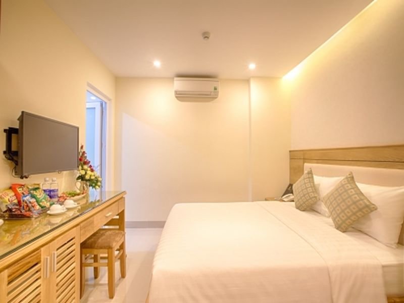 Кровать в общем номере SEA CASTLE HOTEL Da Nang