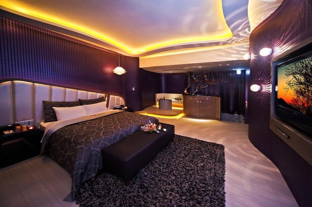 Кровать в общем номере Hefeng Motel