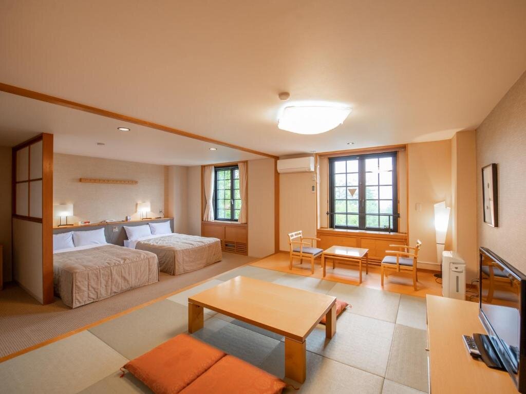 Standard quadruple chambre Hotel Colosseum Inn Tateshina