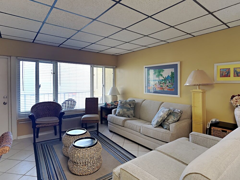 Standard room with balcony and beachfront Continental Condominiums