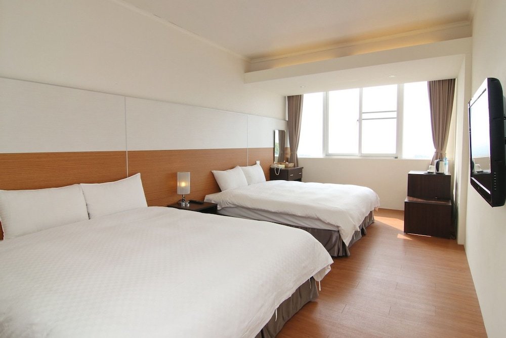 Standard Vierer Zimmer Wusanto Huching Resort Hotel
