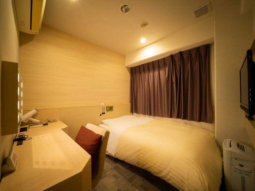 Кровать в общем номере (женский номер) SUPERHOTEL Lohas Kumamoto Hot Springs