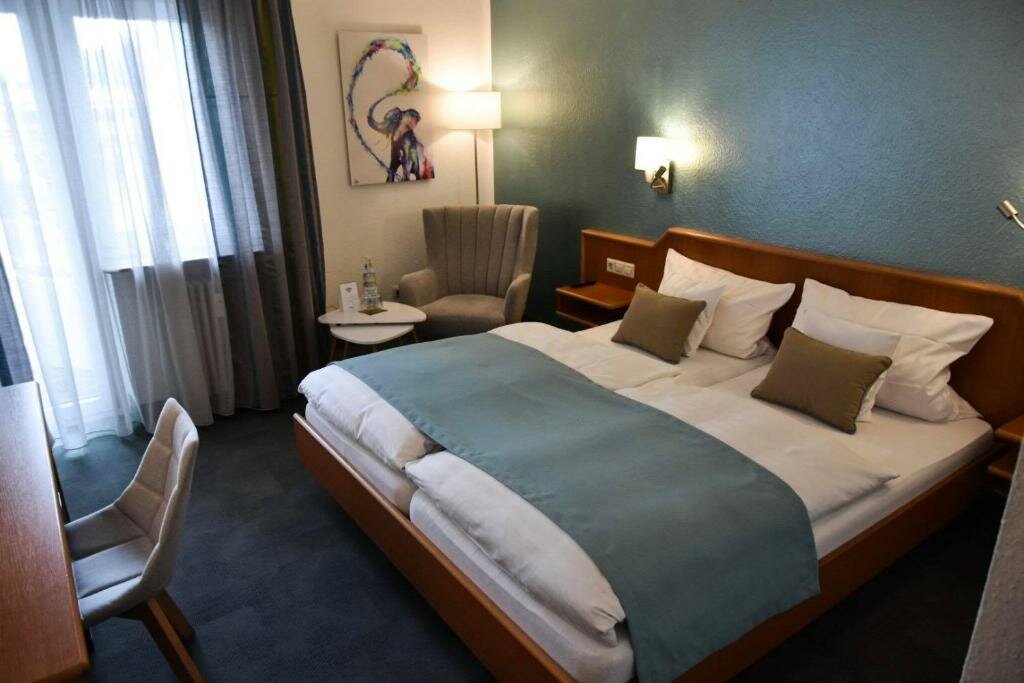 Standard double chambre avec balcon Martins Klause Airport Messe Hotel - air conditioning - self-check-in available