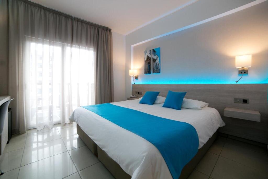 Standard triple chambre Aperçu mer Les Palmiers Beach Boutique Hotel & Luxury Apartments