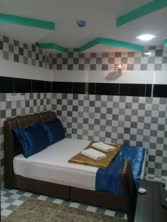 Deluxe chambre Aman Puri Hotel