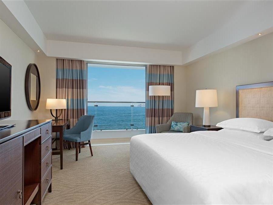 Четырёхместный номер Deluxe с балконом и oceanfront Sheraton Grand Rio Hotel & Resort
