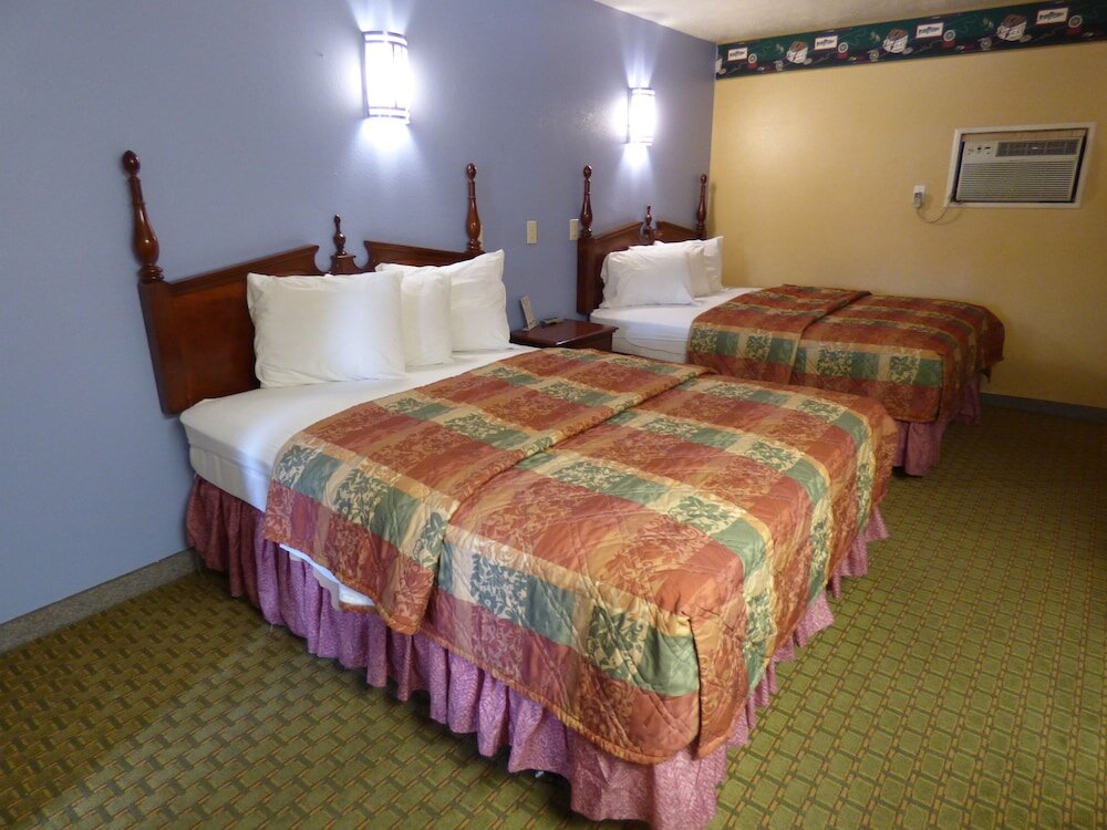 Standard quadruple chambre Coronada Inn & Suites