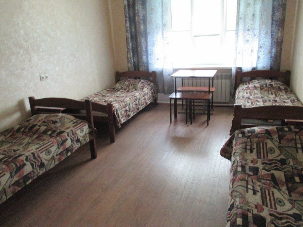 Кровать в общем номере (мужской номер) Гостиница Румотель