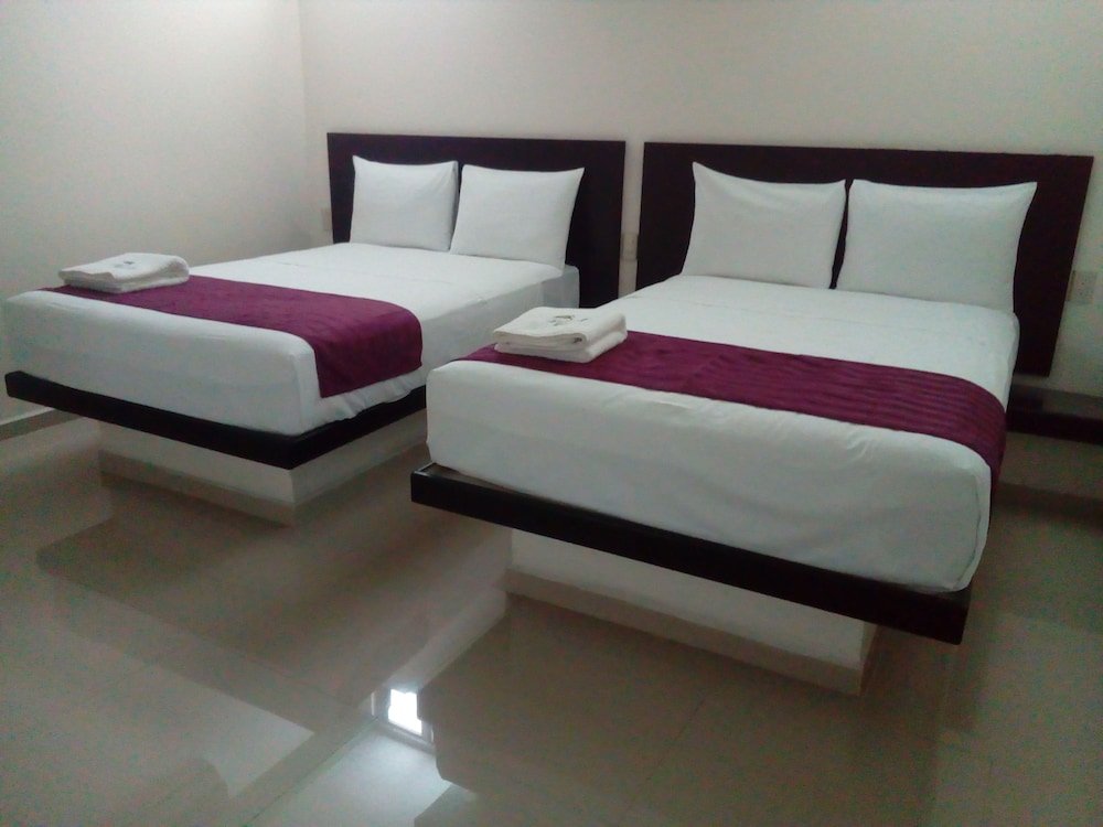 Standard quadruple chambre Hotel La Isla