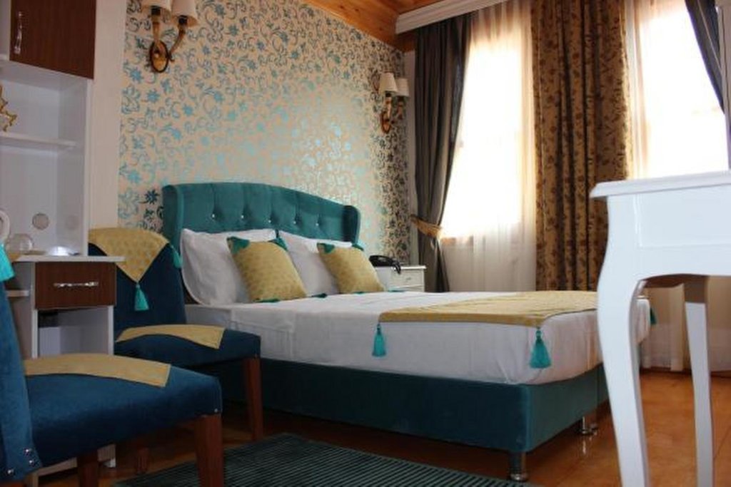 Кровать в общем номере The Trip Hotel