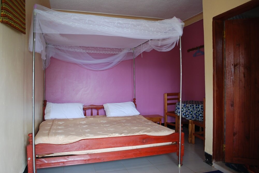 Standard Doppel Zimmer mit Seeblick Crater Bay Cottages