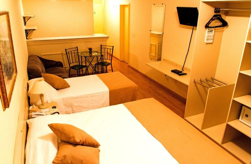 Deluxe triple chambre avec balcon Harbor Self Buriti Hotel
