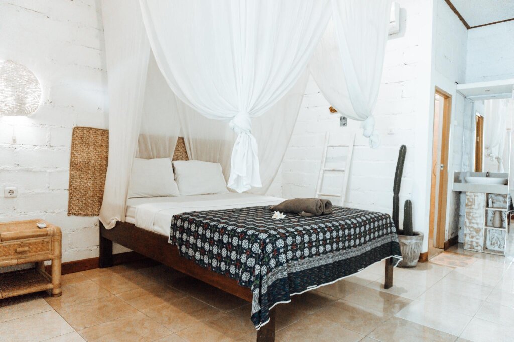 Кровать в общем номере Balangan Inn Surf Homestay