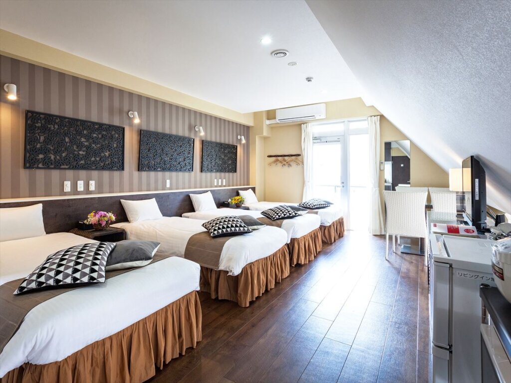 Standard Quadruple room Kariyushi Condominium Resort Naha Sky Living Hotel Asahibashiekimae