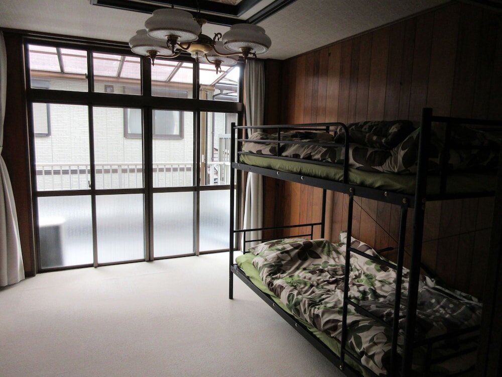 Кровать в общем номере Tsushima Guest House - Hostel