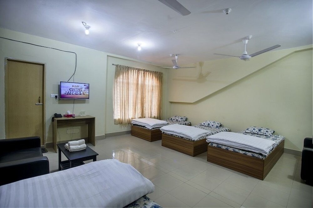 Cama en dormitorio compartido Sreemangal Inn Hotel & Restaurant