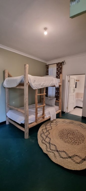 Кровать в общем номере Kizumba House