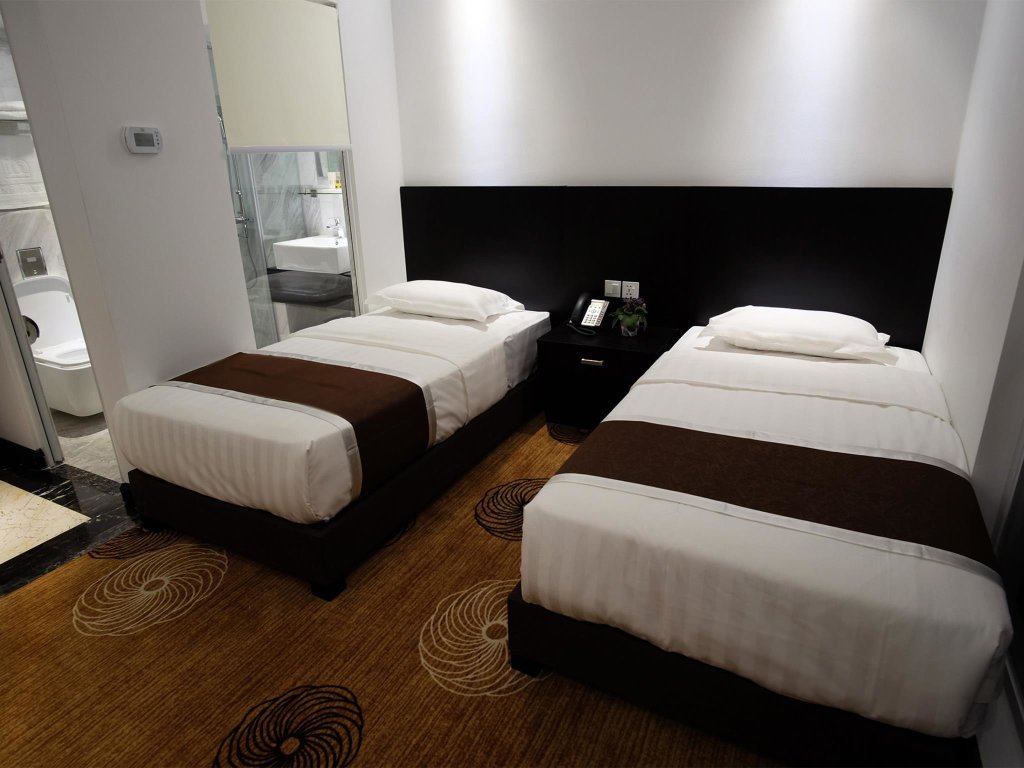Кровать в общем номере InnB Park Hotel