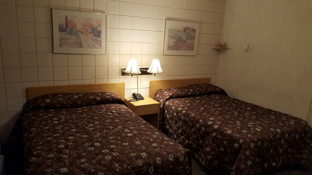 Habitación cuádruple Estándar Safari Inn Motel