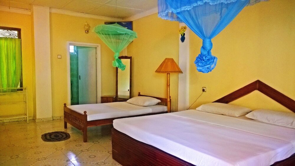 Standard triple chambre 1 chambre Vue jardin Sigiri Holiday Inn