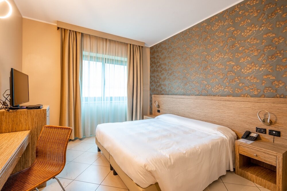 Трёхместный номер Standard Hotel Parisi