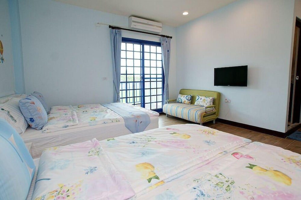 Standard Vierer Familie Zimmer 1 Schlafzimmer mit Balkon Tao Heung Garden B&B