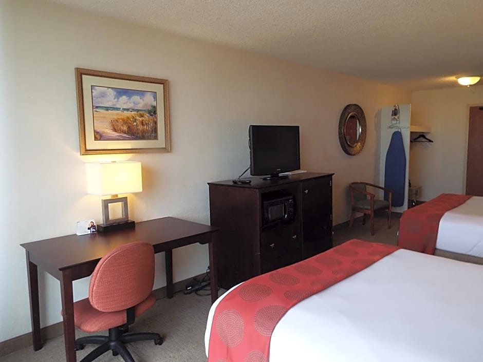 Standard Quadruple room with pool view Ramada by Wyndham West Palm Beach Airport